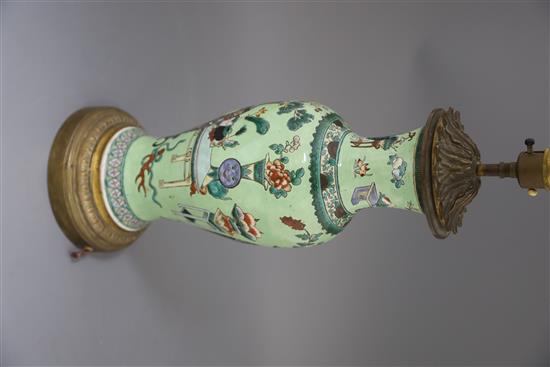 A Chinese famille verte lime green ground vase, late 19th century, H. 42cm including mounts